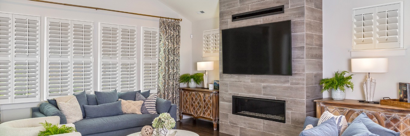 Interior shutters in Shelby living room with fireplace