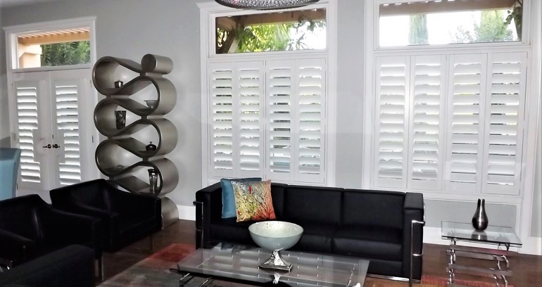 Charlotte DIY shutters in living room.