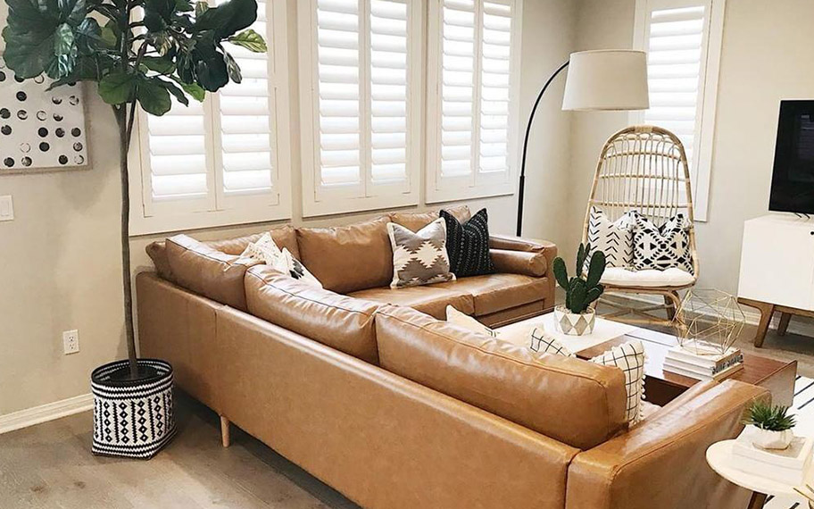 White Polywood shutters in a living room.