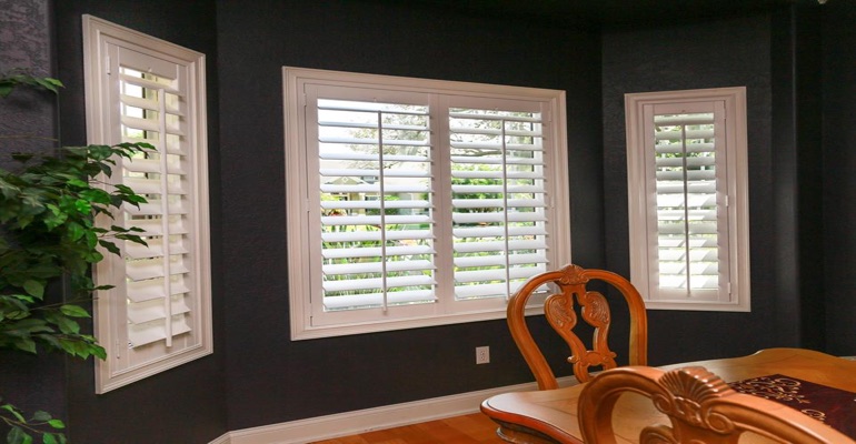 Crisp Polywood Shutters In Dark Green Dining Room