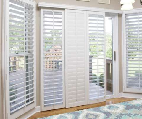 Polywood shutters on a sliding glass door