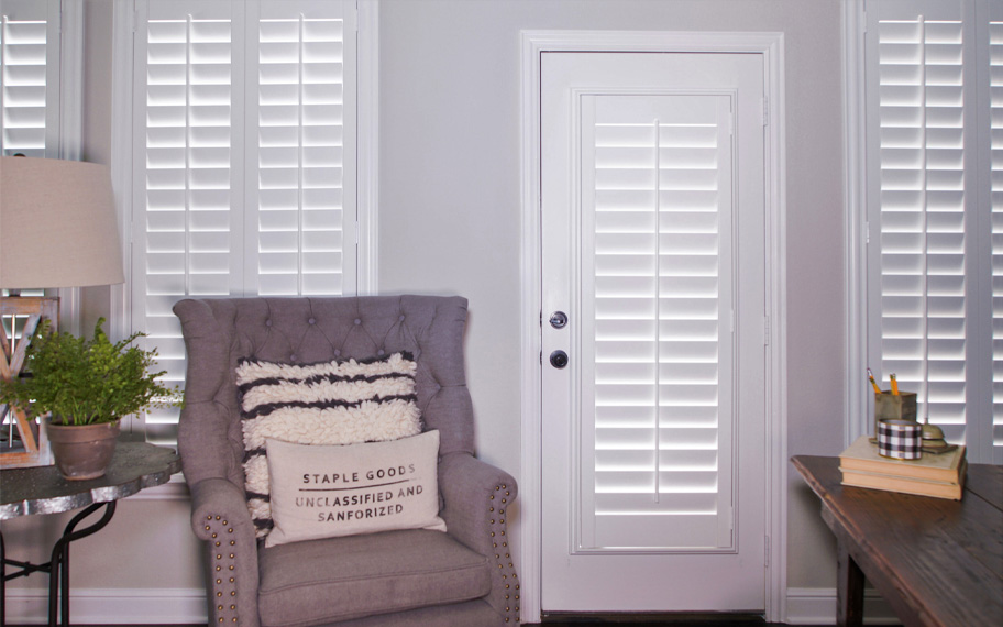 Interior shutters are beautiful and durable window treatments for glass doors in Charlotte. Polywood shutters on a door